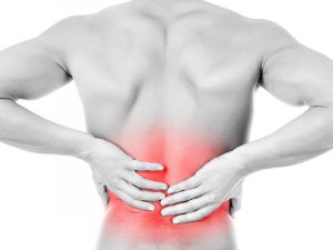 Is it safe to continue squatting or deadlifting with lower back pain